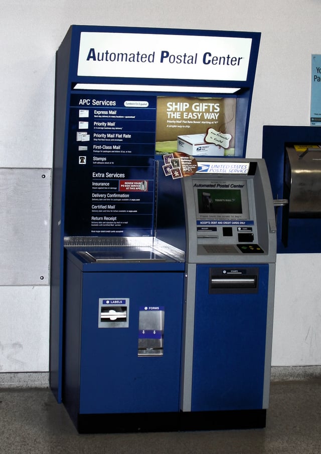 A 24-hour Automated Postal Center kiosk inside the Webster, Texas main post office