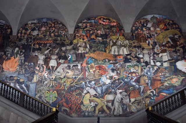 Mural by Diego Rivera at the National Palace depicting the history of Mexico from the Conquest to early 20th century