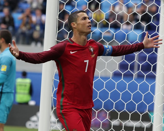 Ronaldo celebrates after scoring a penalty against New Zealand at the 2017 FIFA Confederations Cup in Saint Petersburg, Russia.