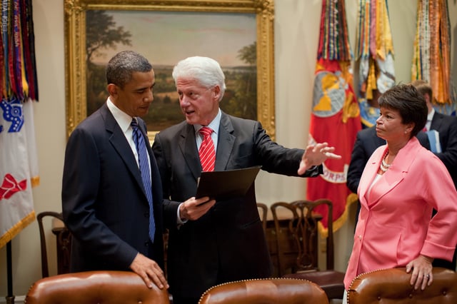 Obama speaking with former President Bill Clinton and Senior Advisor Valerie Jarrett about job creation in July 2010