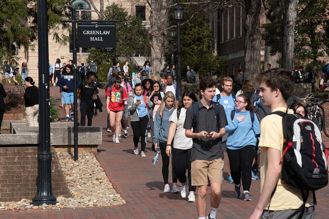 Students walking through campus between classes