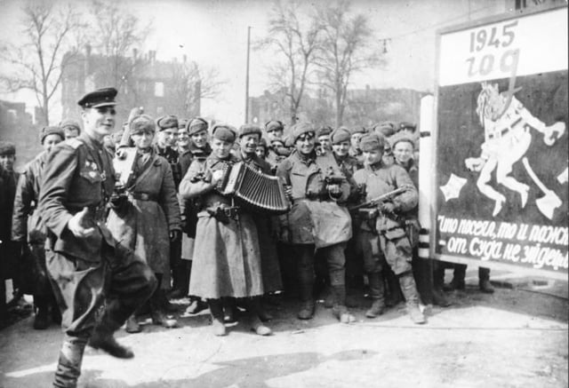 Soviet soldiers celebrating the surrender of the German forces in Berlin, 2 May 1945