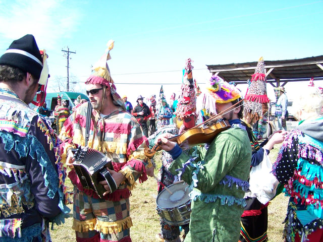 Musicians playing at a traditional Courir de Mardi Gras