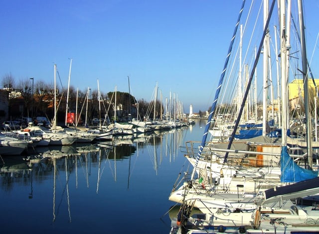 Rimini harbour in winter, with the lighthouse in the background