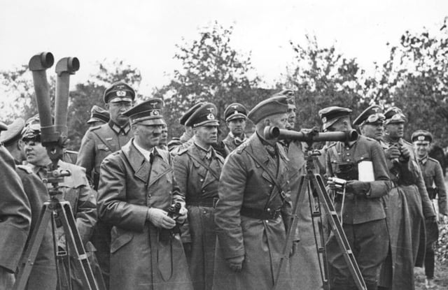 Hitler in Poland (September 1939). Rommel is on his left and Martin Bormann on his right.