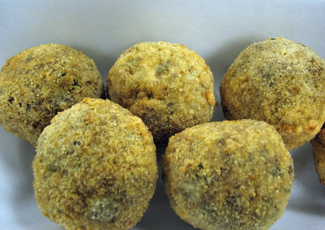 Cajun boudin rolled into a ball and deep fried
