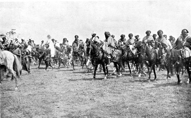 Emir of Kano, with cavalry, photographed in 1911