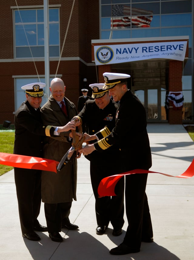 U.S. Navy admirals participate in the ribbon cutting ceremony for the opening of the new Navy Reserve Forces Command Headquarters at Naval Support Activity Norfolk