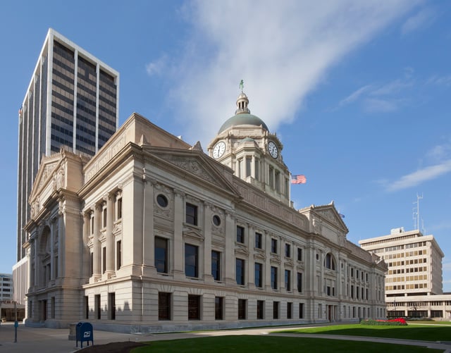 The Allen County Courthouse (center) and the Rousseau Centre (right), home to city and county offices.