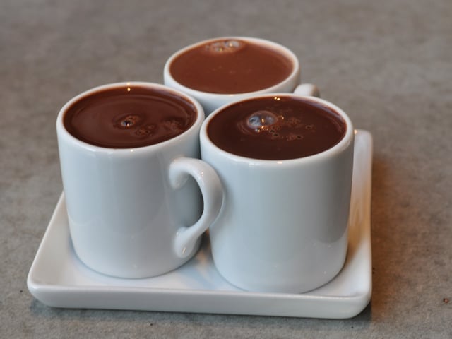 The first chocolate version (liquid) was made by indigenous people in present-day Mexico, and was exported from Mexico to Europe after the Spanish conquest.