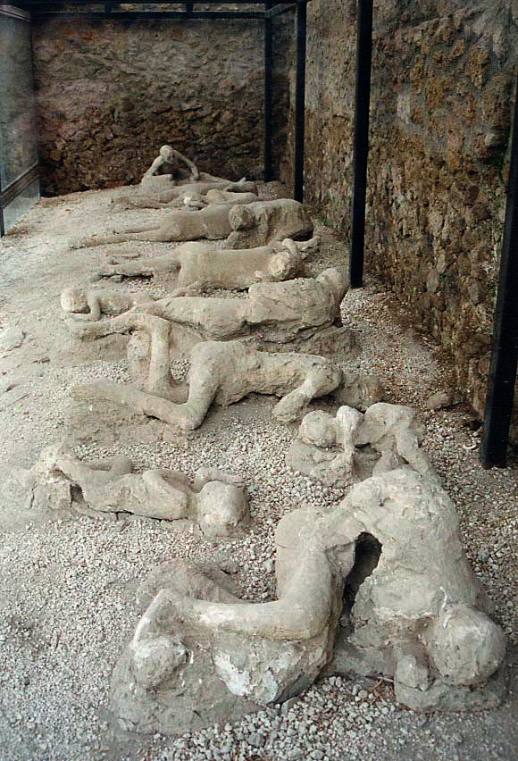 Plaster casts of the casualties of the pumice fall, whose remains vanished, leaving cavities in the pumice at Pompeii