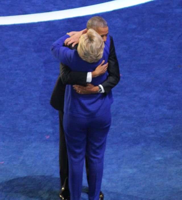 President Obama hugging Hillary Clinton