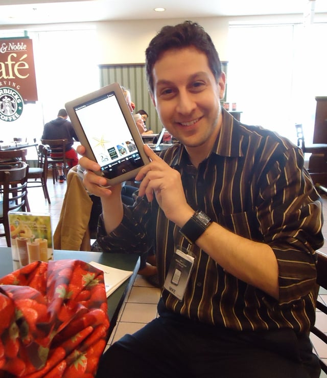 Salesperson demonstrating the Nook Tablet in a Barnes & Noble bookstore in Livingston, New Jersey.