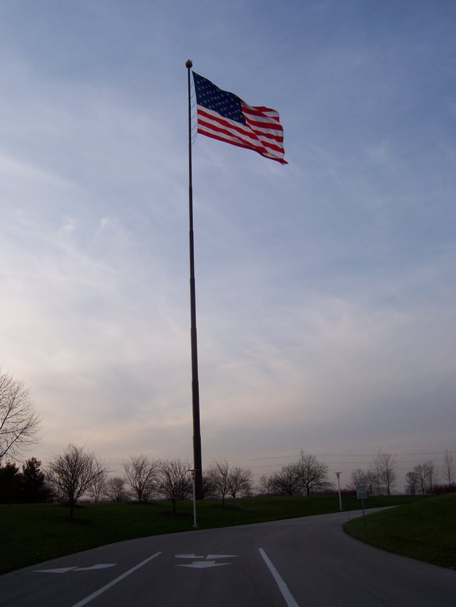 Acuity flagpole, 2006-2008 on the south side of Acuity's corporate campus. The current flagpole is placed on the north side of the campus near an artificial lake.