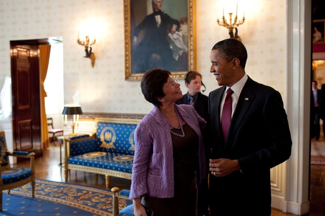 Barack Obama and Valerie Jarrett converse in the Blue Room, White House, 2010