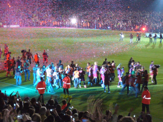 Barcelona players parade La Liga trophy around the Camp Nou in May 2006 after defeating Espanyol in their last home game of the season.