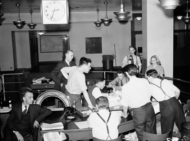 Globe and Mail staff await news of the D-Day invasion. June 6, 1944.