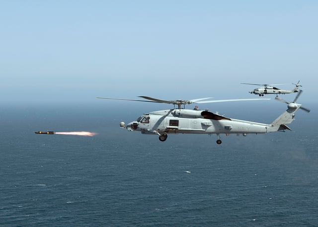 An MH-60R Seahawk firing a live Hellfire missile