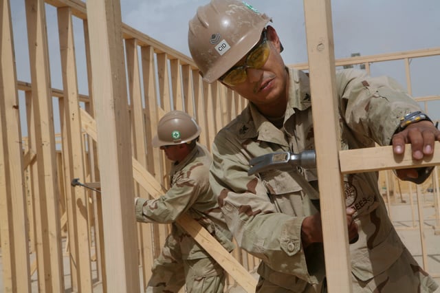 Seabee builders framing walls at Camp Leatherneck in Afghanistan in 2009 (USMC)