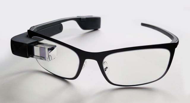 Google Glass with black frames for prescription lenses.