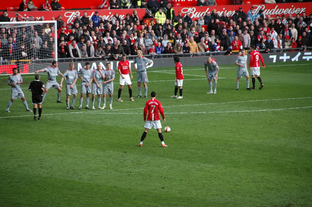 Cristiano Ronaldo preparing to take a free kick in a 2009 match between Manchester United and Liverpool.