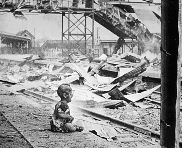 "Bloody Saturday": a baby in the ruins of the old Shanghai South Railway Station after Japanese bombing in August 1937