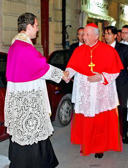 A canon receives Franc Rodé as guest of honour.