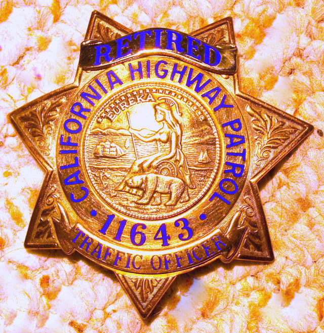 CHP badge. This is for retired officer #11643. Active duty badges are exactly the same, with the "Retired" banner not applied.