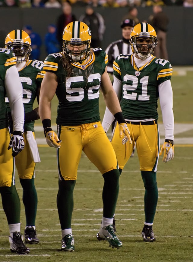 Clay Matthews (52) and Charles Woodson (21), two defensive stars for the Packers under Coach Mike McCarthy