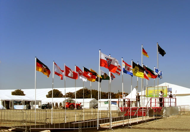 The Ahmadiyya Flag and the German flags at the 2009 German Annual Convention