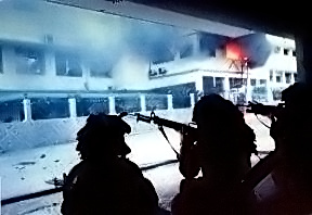 U.S. Army soldiers prepare to take La Comandancia in the El Chorrillo neighborhood of Panama City during the United States invasion of Panama