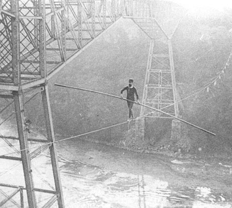 Tightrope walkers use the moment of inertia of a long rod for balance as they walk the rope.  Samuel Dixon crossing the Niagara River in 1890.