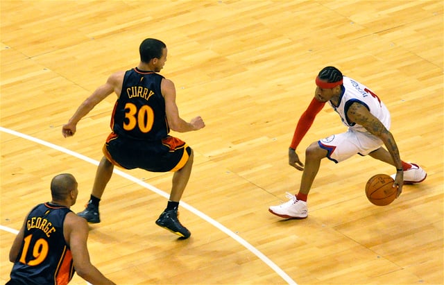 Curry defends against Allen Iverson in 2009