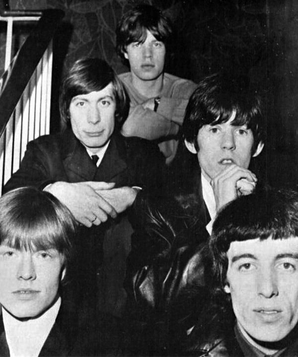 Jagger with the Rolling Stones in 1965. Clockwise from lower left: Brian Jones, Charlie Watts, Mick Jagger, Keith Richards, Bill Wyman