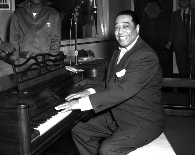 Ellington poses with his piano at the KFG Radio Studio November 3, 1954.