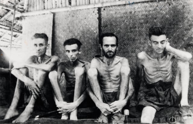 Dutch and Australian PoWs at Tarsau, in Thailand in 1943. 22,000 Australians were captured by the Japanese; 8,000 died as prisoners of war.