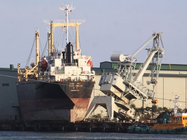 Ship and crane damage at Sendai port