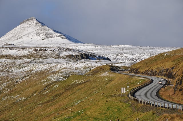 The road network on the Faroe Islands is highly developed. Shown here is the road from Skipanes to Syðrugøta on the island of Eysturoy.