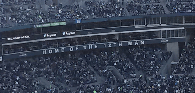 "Home of the 12th Man" signage within CenturyLink Field in 2013.