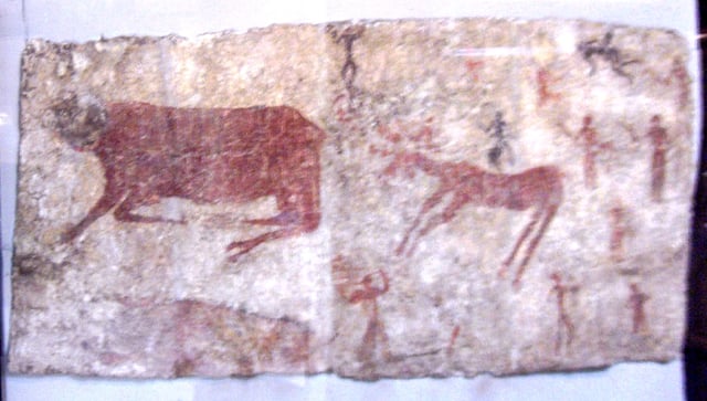 Mural of aurochs, a deer, and humans in Çatalhöyük, which is the largest and best-preserved Neolithic site found to date. It was registered as a UNESCO World Heritage Site in 2012.