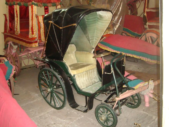 An old Polocart displayed at City Palace, Jaipur. The museum also displays a "night polo ball" with a rotating platform on which a candle is placed.