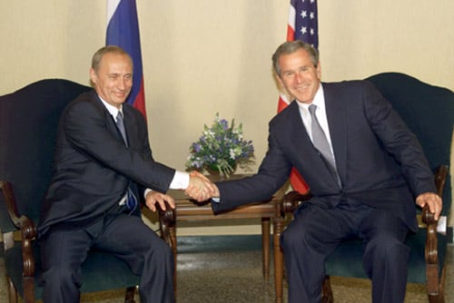 With George W. Bush in July 2001