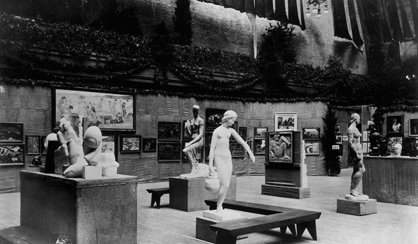 Armory Show, 1913, North end of the exhibition, showing some of the modernist sculptures. In Arts Revolutionists of Today (1913), the caption for this photo reads: "At the left of the picture is a much-discussed portrait bust of Mlle. Pogany, a dancer, by Brâncuși. This freak sculpture resembles nothing so much as an egg and has excited much derision and laughter..."