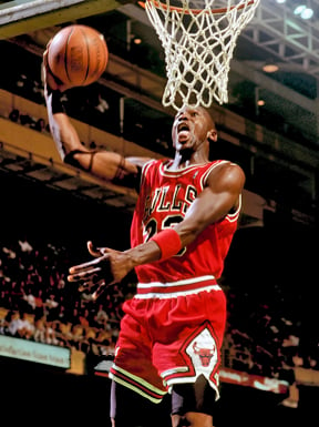 Michael Jordan goes to the basket for a slam dunk in 1987.