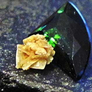 A kidney stone (yellow) composed of calcium oxalate