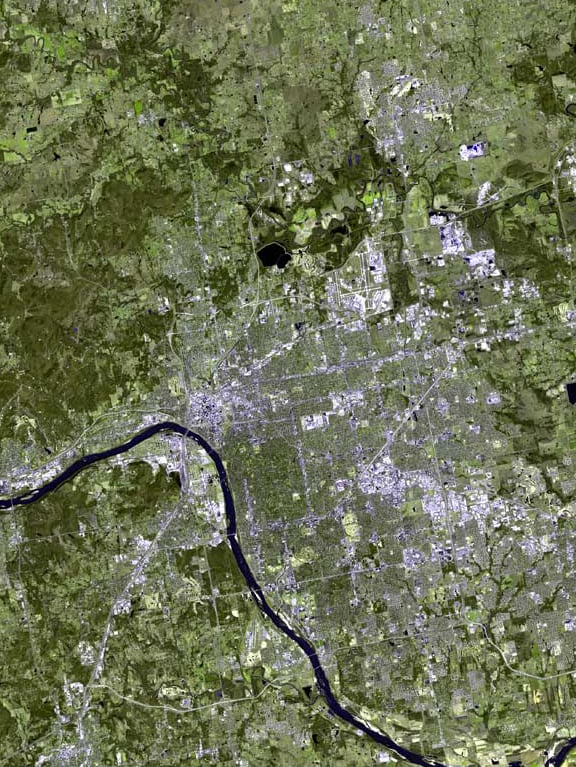 As seen from space, most of Tulsa lies east of the Arkansas River.