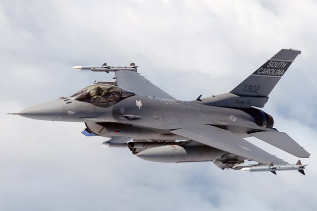 F-16C of the South Carolina Air National Guard in-flight over North Carolina equipped with air-to-air missiles, bomb rack, targeting pods and Electronic Counter Measures pods