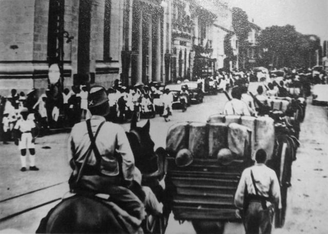 Japanese troops entering Saigon in 1941.