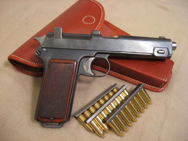 Steyr Hahn M1912 show with 9×23mm Steyr ammunition on stripper clips.