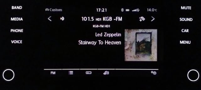 2017 VW Golf entertainment system displaying song metadata including Artist Experience from San Diego's KGB-FM.